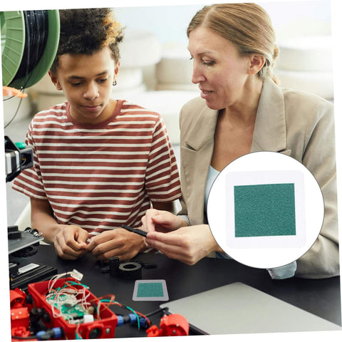 Teacher demonstrating Magnetic Flux Display Sheet Reusable Magnetic Viewing Film for educational projects in classroom