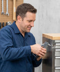 Man using Aluminum Blind Rivet Kit With 166 Pieces In 11 Sizes From 1/8 Inch To 3/16 Inch for cabinet assembly
