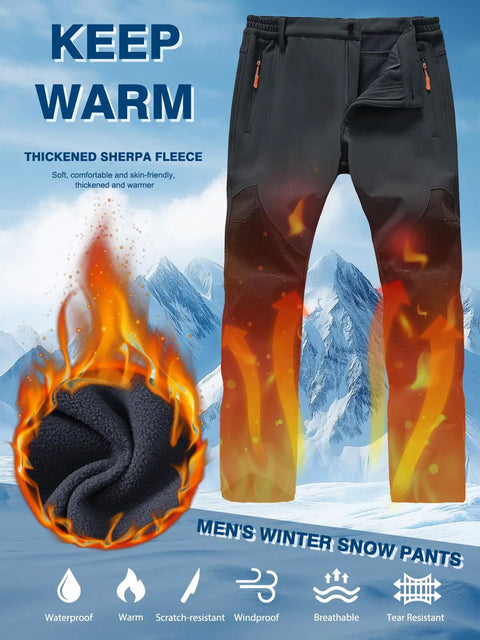Men's Ski Waterproof Insulated Softshell Snow Pants With Fleece Lining And Zipper Pockets For Snowboarding And Outdoor Winter Activities Dark Gray 42W By 32L with fleece lining and flames design in a snowy mountain background.