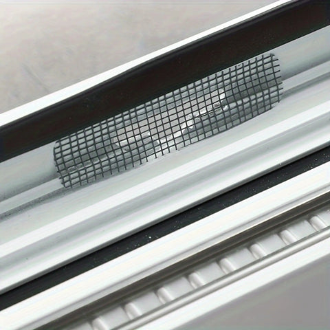 Close-up of a mesh patch from a 50 Piece Window Screen Repair Kit With Self Adhesive Patches And Mesh No Tools Needed For Door And Window Screens Easy To Use Fix Kit For Home Repairs Keeps Bugs Out And Screens Looking Great, applied on a window.