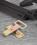 Heavy Duty Sofa Position Buckles For Couch And Furniture, Iron Connecting Hardware with visible golden finish on concrete surface
