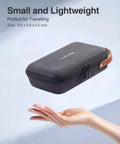 The Ultimate Go To Tech Organizer Travel Case For Portable Electronics And Daily Cord Management Featuring A Smooth Leather Handle Compact Fit shown in hand for size reference.
