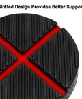 Round black rubber floor jack pad with grooved surface, close-up view.