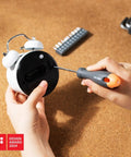 Person using screwdriver from Compact DIY Tool Set For Home Improvement With Stackable Handy Tool Kit Including Adjustable Wrench, Screwdrivers, Hammer, Pliers, Tape Measure, Gift Ready Package For Home Maintenance And Quick Fixes on clock back.