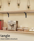 8 Piece L Shaped Metal Shelf Brackets for Wall Mounts, supporting a laminated wooden shelf with kitchen items displayed underneath.