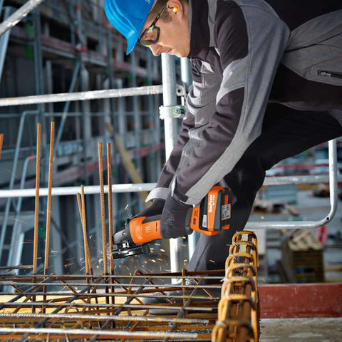 Professional Cordless Angle Grinder Runs Smooth And Hits Hard With Multi Volt Battery Interface Built Tough cutting rebar on site.