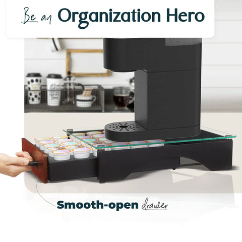 Person using Heavy Duty K Cup Drawer Organizer For Coffee Pods With Solid Steel Real Wood And Tempered Glass Construction on countertop