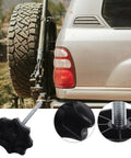 Spare Tire Hold-Down Bolt Replacement And Wheel Carrier Clamp Hardware For Vehicle Safety attached to SUV rear.