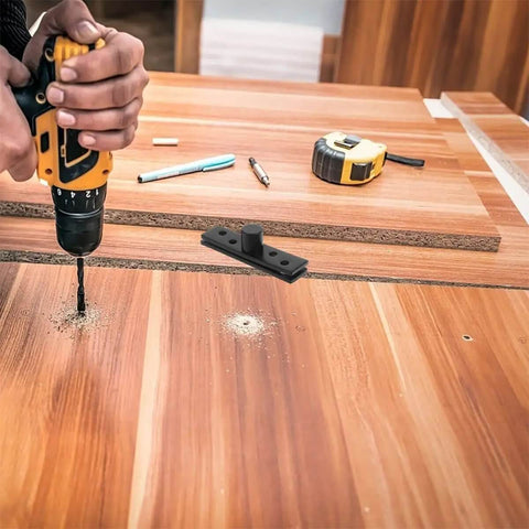 Carpenter installing Stainless Steel Hidden Pivot Door Hinges With 360 Degree Rotation Concealed Center Shaft Hardware on wooden panel