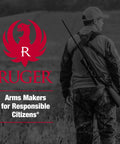 Hunter wearing camouflage with Built Tough Heavy Duty Two Point Tactical Rifle Sling With Quick Detach Swivels in field.