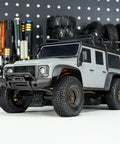S5 60x20mm XHX Pin Tire For SCX24 FCX24 1/18 1/24 RC Crawlers on gray RC vehicle.