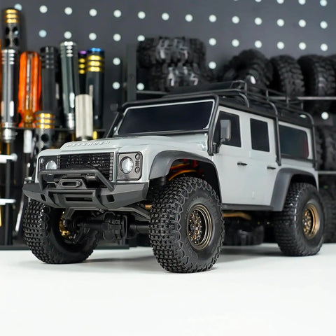 S5 60x20mm XHX Pin Tire For SCX24 FCX24 1/18 1/24 RC Crawlers on gray RC vehicle.