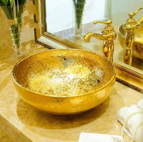 USZWBY Bathroom Vessel Sink, Countertop Basin Round Sink Bathroom Sink Hotel Art Sink Bathroom Sink in gold on marble countertop.