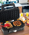 3 In 1 Sandwich Maker Waffle Maker With Removable Plates And Panini Press, 1200W, in use making waffles on a kitchen counter