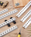 Ten Piece 12 Inch Aluminum DIN Rails Top Hat Slotted 35mm Wide 7mm High With Screws for automation equipment on wooden surface