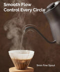 Gooseneck Electric Kettle With Precise Temperature Control Plus Or Minus One Degree Fahrenheit pouring water into filter