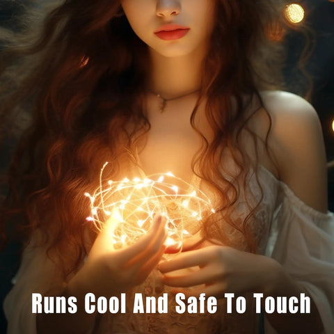 Woman holding Six Pack Battery Operated Fairy Lights With Timer And Remote Six Point Five Foot Copper Wire 20LED Warm White Twinkle Lights