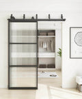 Bypass Glass Barn Door Kit With Double 6-Foot Hardware, installed sliding door in black carbon steel frame with reeded glass.