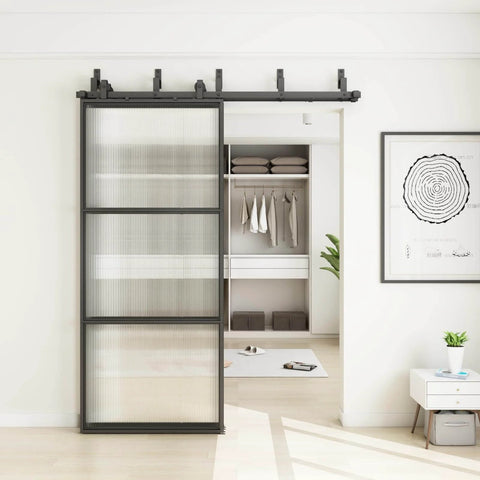 Bypass Glass Barn Door Kit With Double 6-Foot Hardware, installed sliding door in black carbon steel frame with reeded glass.