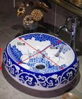 Slick Oval Vessel Sink For Bathroom Vanity Top Notch Premium Porcelain Countertop Wash Basin featuring hand painted lotus bird motif, 50cm x 40cm, high gloss finish.