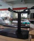 High Power Electric Hydrofoil Surfboard with Full Carbon Fiber Build and 8000W motor in workshop, side view
