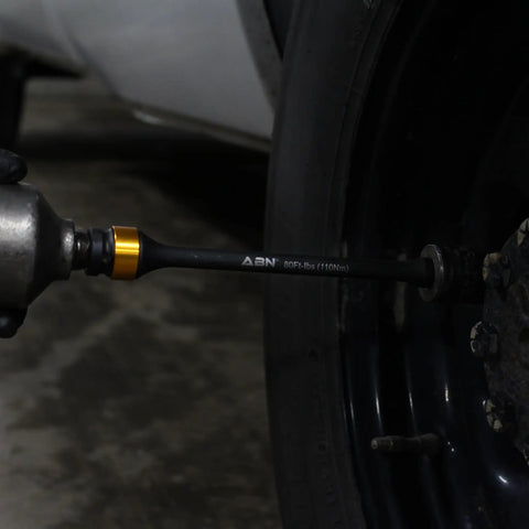 Using half-inch drive 8-inch long torque limiting socket extension bar on car wheel