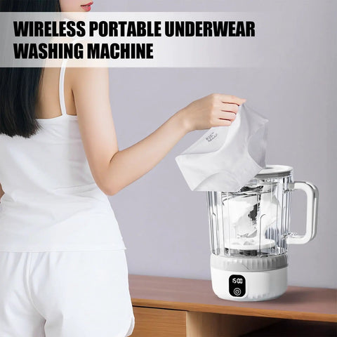 User adding white underwear to the Straight Fire Cordless Mini Washing Machine Portable Underwear Cleaner on a wooden surface.