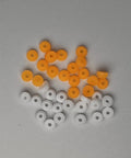 10 Sets Pro Fingerboard Truck Bushings Orange And White PU Material Fits All Pro Fingerboard Trucks Random Colors Durable And Stiffer Than Standard Bushings For Dope Smooth Turns And Precise Grips arranged on a flat surface