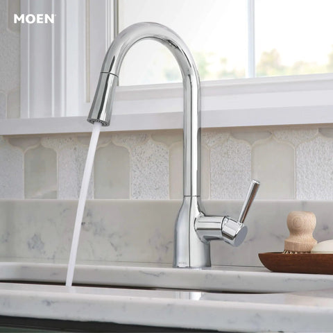 Adler Chrome One Handle Kitchen Faucet With Power Clean Spray And Smooth Reflex High Arc Pull Down Sprayer flowing water in modern kitchen