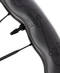 Close-up of the Unaas Pro2 700C Carbon Fiber Wheelset With Disc Brakes Ultralight 1430g rim displaying tubeless valve and spoke design.