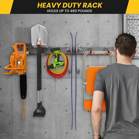 Garage Wall Mount Tool Organizer With Heavy Duty Hooks 48 Inch Steel Yard And Garden Tool Holder Holds Up To 450 Lbs For All Your Gear Rake Broom Mop Snowboard And More Keeps Your Workshop Shed And Garage Clutter Free installed in garage
