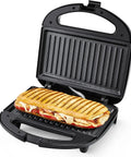 OSTBA 2 Slice Sandwich Maker Grill With Powerful 750W Non Stick Plates For Fast Even Toasting Crispy Wraps And Easy Clean Up Compact Kitchen Appliance with sandwich.