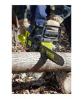 14 Inch Brushless Chainsaw 40 Volt Cordless Power Tool Freaky Fast Cuts Auto Oil Sprayer in action cutting a log.