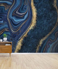 Peel And Stick Blue Marble Wallpaper Rolls 144 Inch Wide By 100 Inch High Self Adhesive Decor For Walls With Golden Veins Mosaic Pattern And A Jaw Dropping Luxe Look installed on a wall with a small wooden cabinet.