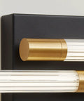 Close-up of black and gold slick vanity lights for bathroom 30 inch LED vanity lighting fixtures with acrylic striped shade.
