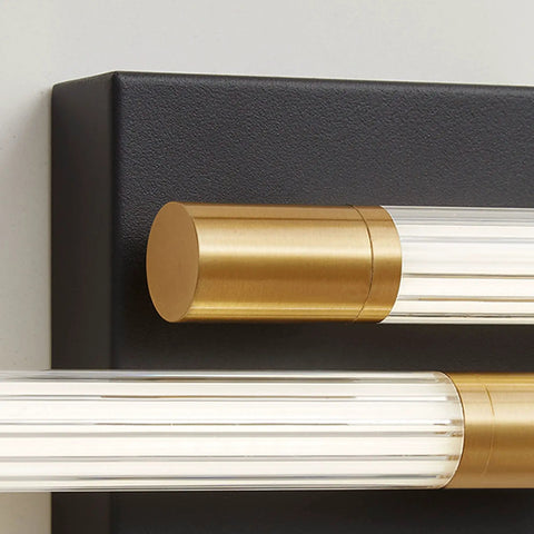 Close-up of black and gold slick vanity lights for bathroom 30 inch LED vanity lighting fixtures with acrylic striped shade.