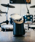 Heavy Duty Metal Electronic Drum Cymbals Arm Positioner Limiter visible from the front with a backdrop of a drum kit.