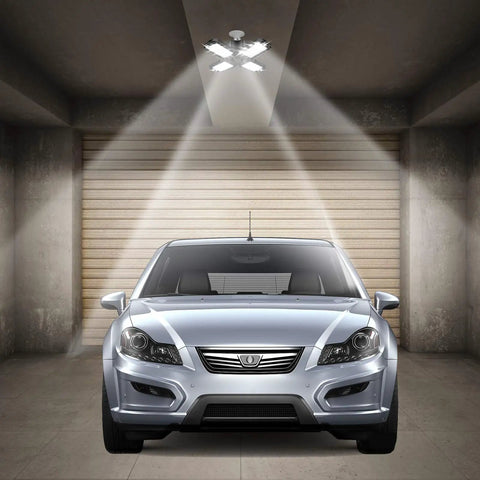 2 Pack 60W Garage Light 4 Panel LED Ceiling Fixture 6500K Daylight, 12000LM High Lumen Output illuminating a car in garage