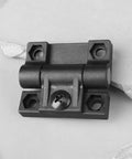 Close-up of Four Pack 36x42mm Black Plastic Adjustable Torque Hinges For Wardrobe Cabinets Doors And Wooden Storage Boxes With Smooth Dampening