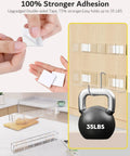 Slick 9.5 Inch Acrylic Straw Organizer Clips Securely To Cabinet Doors With Extra Grippy Adhesive Strips Features Sloped Drainage Base Keeps Countertops Totally Clutter Free And Ready For Use with strong adhesive tape and 35LB weight capacity.