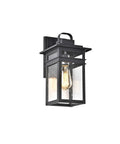 Sleek Transitional 1 Light Textured Black Outdoor Wall Sconce With Clear Seedy Glass Downlight, 13 Inch Height, Hardwired