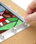 Professional Stained Glass Layout Block System With 80 Push Pins holding stained glass panel square with aluminum frame.