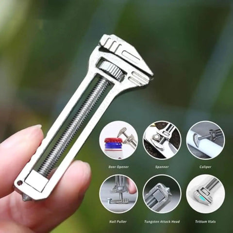 Mini Multitool Wrench with Bottle Opener, Nail Puller, 2.8 Oz Alloy Steel 6 in 1 Measuring Caliper held in hand shown with features.