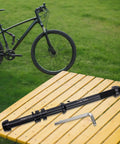 Beefed Up Heavy Duty Adjustable Thru Axle Skewer For Bike Trainers 12x142 to 148mm, CNC Aluminum Alloy on outdoor table