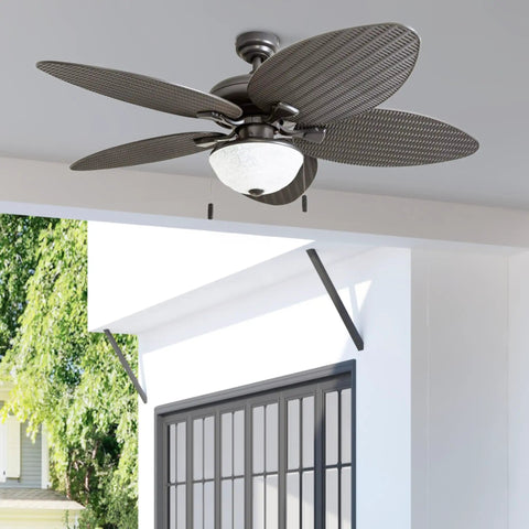 Inland Breeze Tropical 52 Inch Indoor Outdoor Ceiling Fan With Light, Five Blades, Reversible Motor, Bronze Finish on porch ceiling.