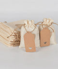 Assorted Burlap Jewelry Pouches Set Of 51 Small Gift Bags For Weddings And Special Occasions with beige linen look and tags