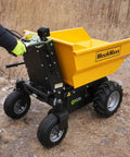 Electric Mini Dumper 1100Lbs Capacity Wheel Barrow With 48V Brushless Motor Powerful Dump Cart Feature Rechargeable Battery in use