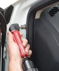 Drive90Plus Right Angle Drill Attachment used in tight space for car interior, showing impact-ready gears and Phillips driver bit