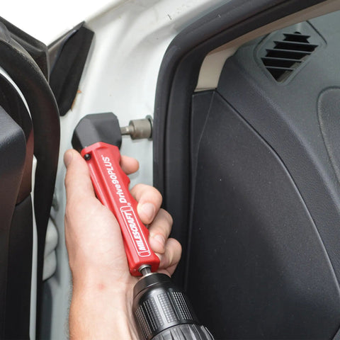 Drive90Plus Right Angle Drill Attachment used in tight space for car interior, showing impact-ready gears and Phillips driver bit
