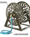 Heavy Duty Garden Hose Reel With Wall And Floor Mount Decorative Hose Holder And Winder For Outdoor Storage Built Tough Steel Construction Holds 200 Feet Of Five Eighths Inch Hose Not Included Keeps Yard Neat And Tidy shown in Love Flower design with brass connector and included leader hose.